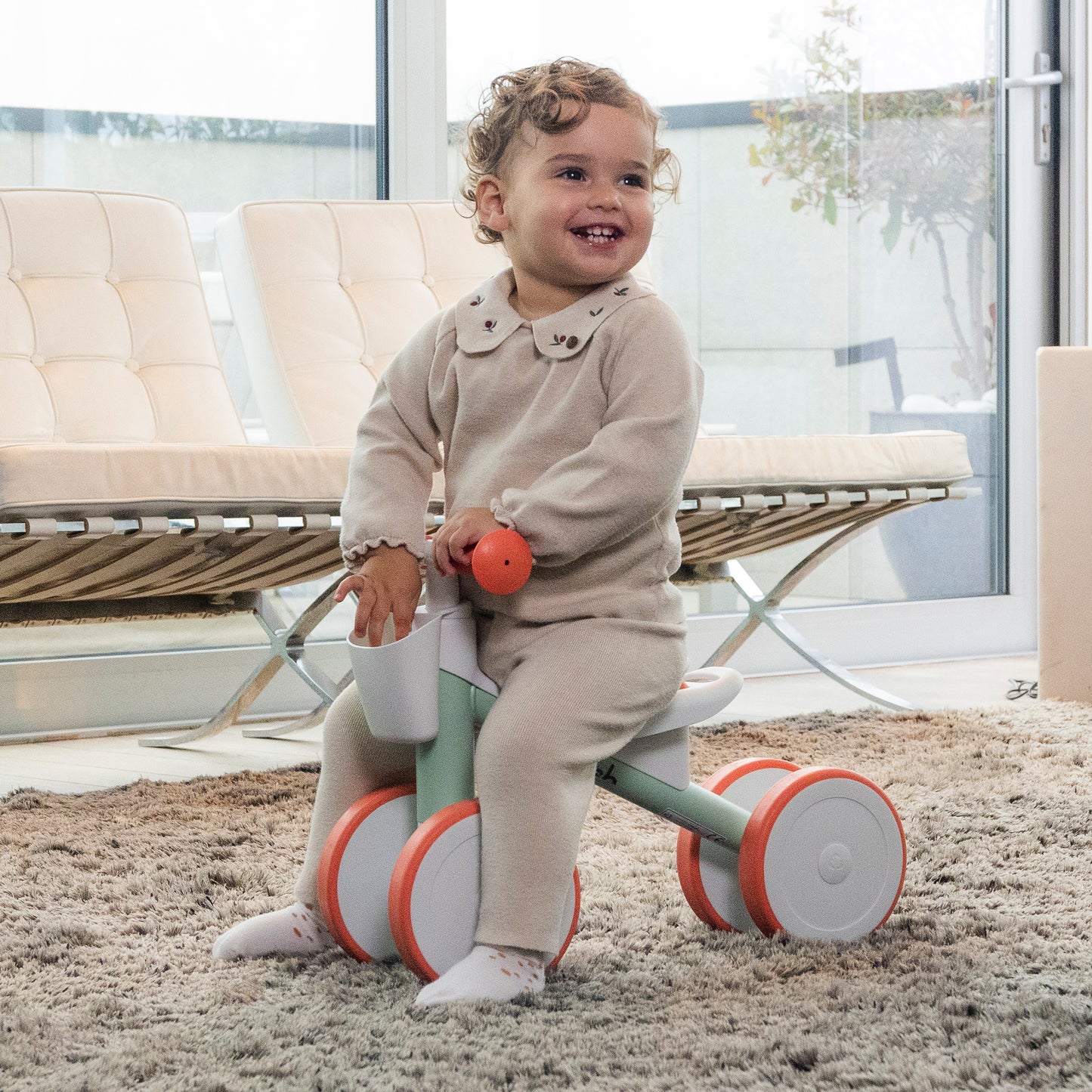 Quadi Racer-	4-wheel balance ride-on with storage basket