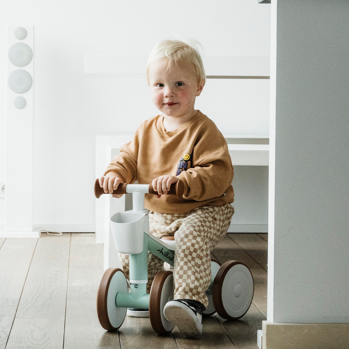Quadi Racer-	4-wheel balance ride-on with storage basket