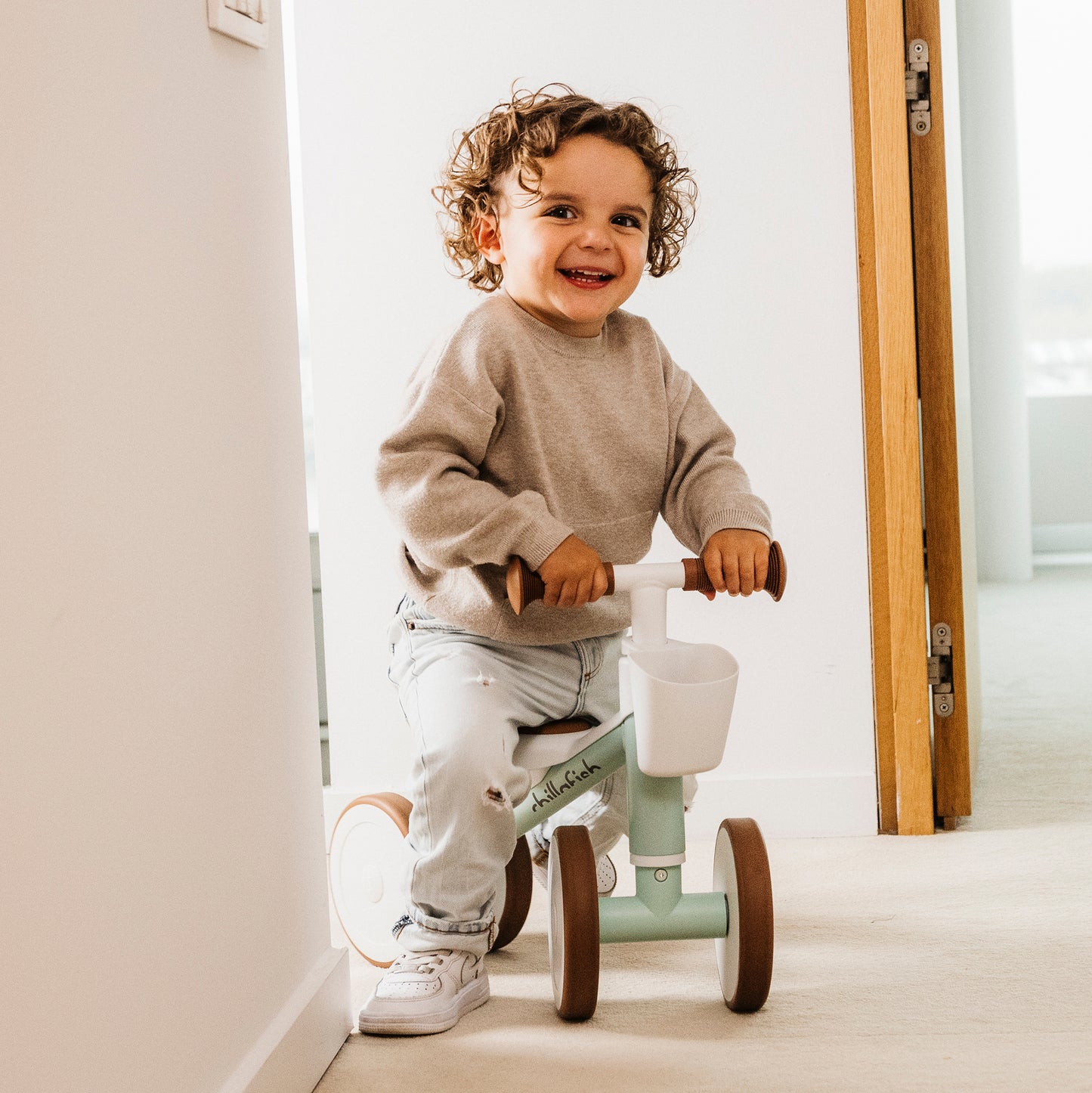 Quadi Racer-	4-wheel balance ride-on with storage basket